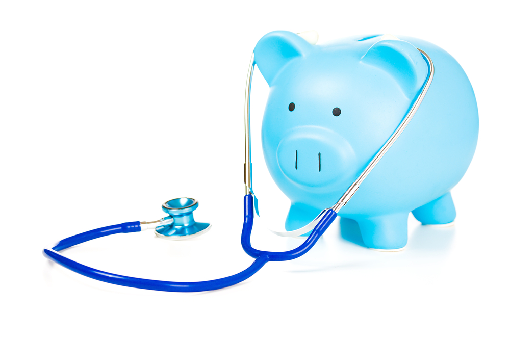 Piggy,Bank,And,Stethoscope,Isolated,On,White,Background.,Health,Care
